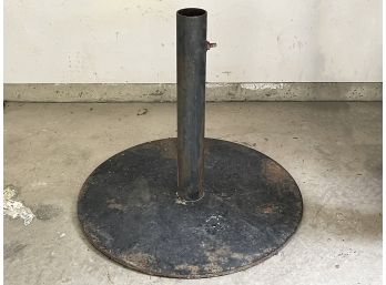 A Hefty And Heavy Iron Umbrella Base