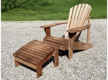 An Adirondak Chair In Weathered Oak