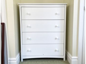 A White Painted Wood Chest Of Drawers