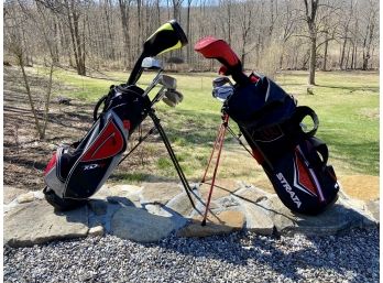 Two Sets Of Golf Clubs With Standing Carry Bags