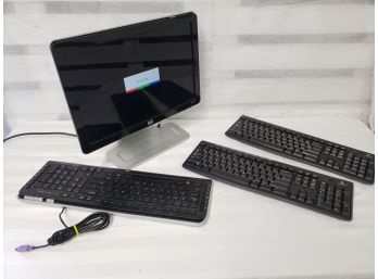 HP Computer Monitor & Three HP & Logitech Computer Keyboards
