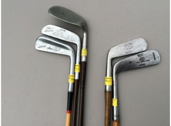 Mix Of Wood Shaft And Sheathed Clubs