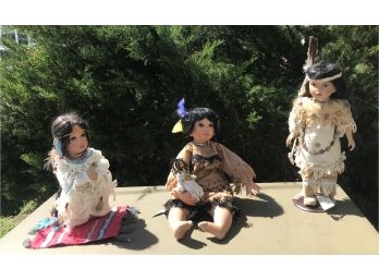 Three Beautiful Porcelain Dolls