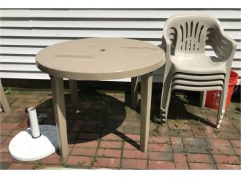 Round Plastic Table Four Chairs & Umbrella Stand