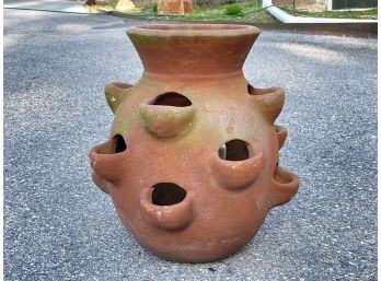 A Terra Cotta Strawberry Pot