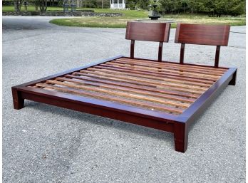 A Modern Mahogany King Bedstead By Pottery Barn