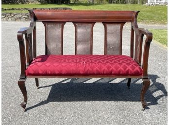 An Antique Cane Back Hall Bench