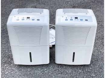 A Paid Of Dehumidifiers