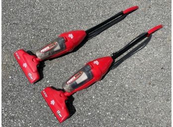 A Pair Of Dirt Devil Vacuums