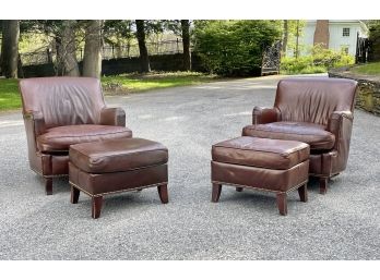 A Pair Of Leather Armchairs And Ottomans With Nailhead Trim By Bradington Young