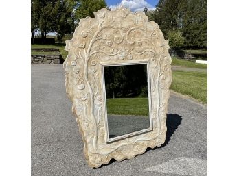 A Tole Painted Repousse Framed Mirror