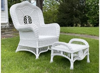 A Vintage Wicker Arm Chair And Ottoman