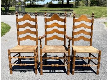 A Trio Of Rush Seated Dining Chairs