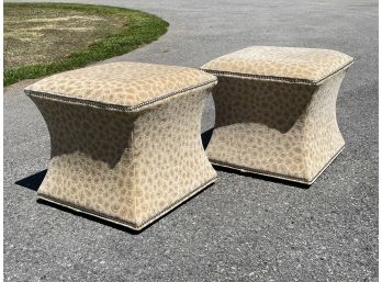 A Pair Of Upholstered Ottomans In Animal Print With Nailhead Trim