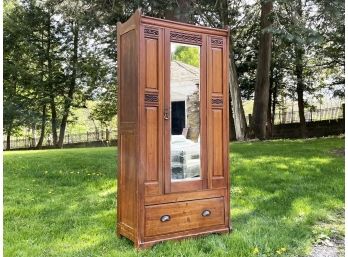 A 19th Century Carved Wood Wardrobe Cabinet