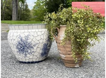 A Pairing Of Decorative Planters