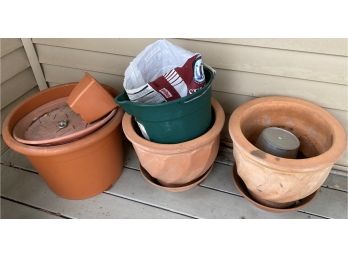 Terra Cotta And Plastic Planters