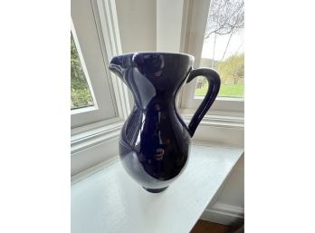 Curvy Ceramic Dark Blue Pitcher With White Interior