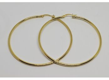 Large Hoop Earrings In 14k Yellow Gold Over Sterling