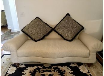 Pearson Beige Couch With Walnut Legs And Beige & Black Leopard Pillows