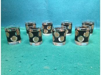 Set Of Eight (8) Mid-Century Modern MCM Libbey Gold Coin And Pebbled Black Low Ball Cocktail Glasses.