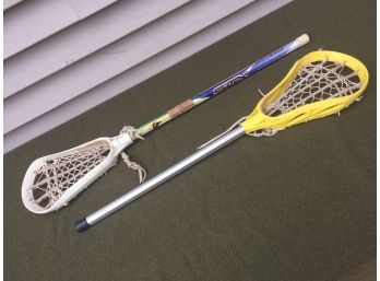 Two Women's Or Girl's Lacrosse Sticks. Silver Shaft And STX AL6000 Staft.