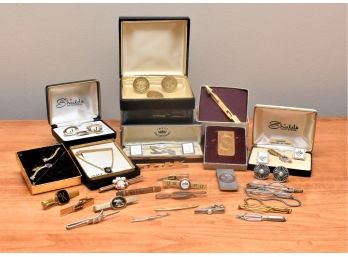 Collection Of Cuff Links And Tie Clips