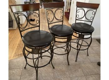 Three Swivel Bar Stools