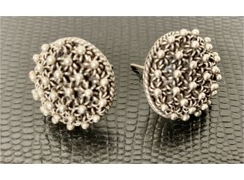 Round Silver Pierced Earrings With Nice Design On Them