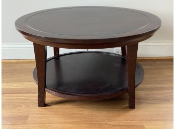 Large, Round Coffee Table In A Dark Stain