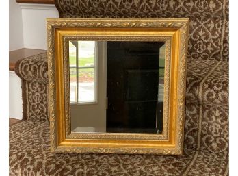 A Gilt-Framed, Square Beveled Mirror