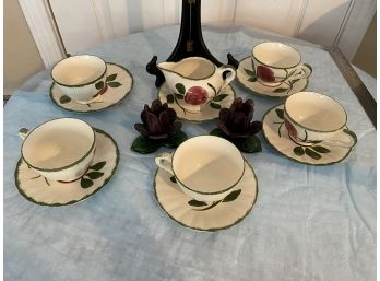 Cup And Saucer Set And Some Candle Holders