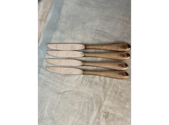 Four Stainless Knives