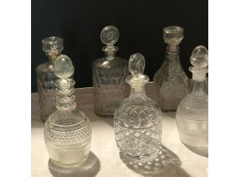 Six Decanters With Tops