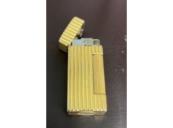 Vintage Dunhill Rollalite Gold Plated Lighter . 2 Inches Long 1 Inch Wide