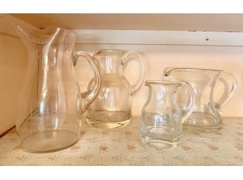 Four Good Quality Glass Pitchers (4)