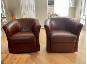 Pair Of Swivel Saddle Brown Club Chairs