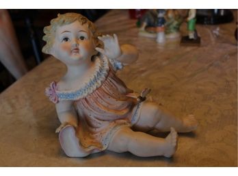 Porcelain Painted Baby Figurine