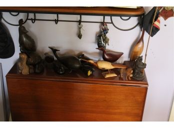 Lot Of Carved Items On Table