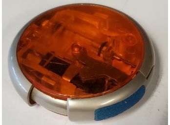 Vintage Cigarette Lighter With A Fun Form: Shaped Like A Flying Saucer With A Transparent Orange Construction