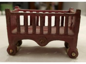 Antique Kilgore Manufacturing Co Cast Iron Toy - Dollhouse Furniture Baby's Red Crib On Metal Wheels