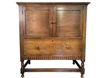 Antique English Cabinet With Hidden Drawers And Beaded Molding Detail