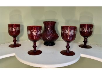 Four Red/Cranberry Grape Etched Motif Glass Stems And Matching Red Carafe