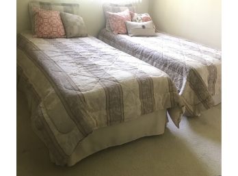 A Pair Of Twin Size Bedding Ensembles