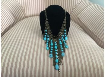 Necklace Centered With Triple Chaining, Turquoise Beading, And Rhinestones