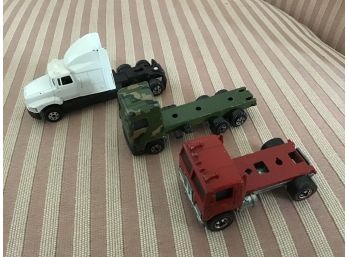 Three Flatbed Trucks Hot Wheels - Lot #14