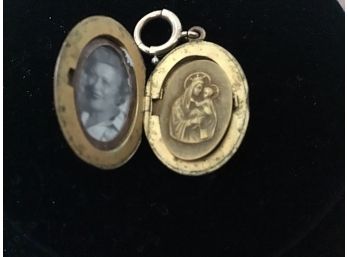 Vintage Gold Filled Locket With Raised Figures Of Mary And Christ And The Sacred Heart