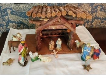 Hand Crafted Log Christmas Manger With Some Of The Figurines Still Intact