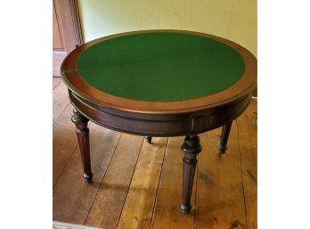 Antique Mahogany Flip Top One Drawer Game Table With Four Turned Legs And Wood Casters