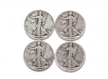 Four Walking Liberty Half Dollars